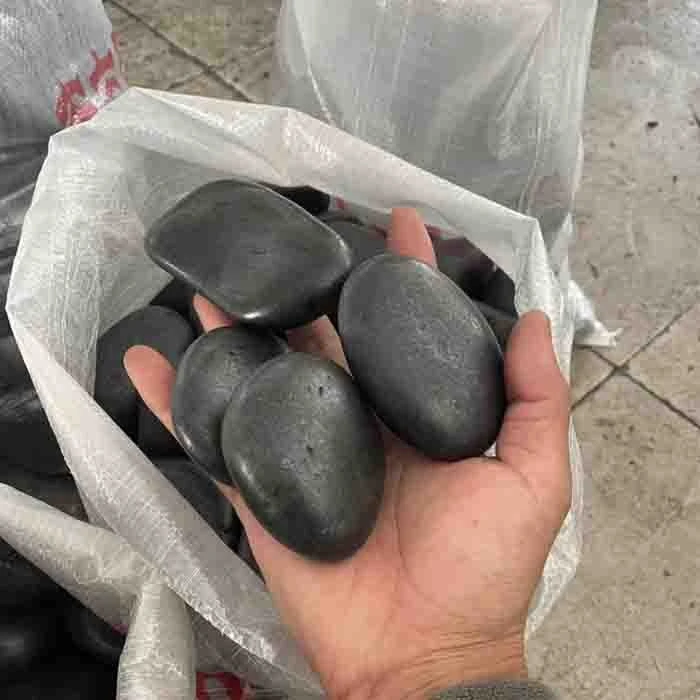 black polished river pebbles